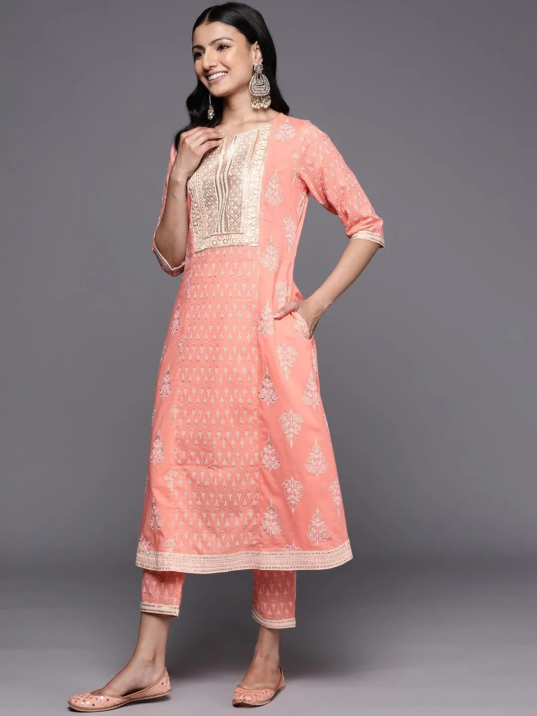 Peach Yoke Design Cotton A-Line Kurta With Trousers & Dupatta